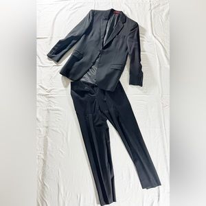 Lightly worn Alfani black suit. Includes jacket and pants.